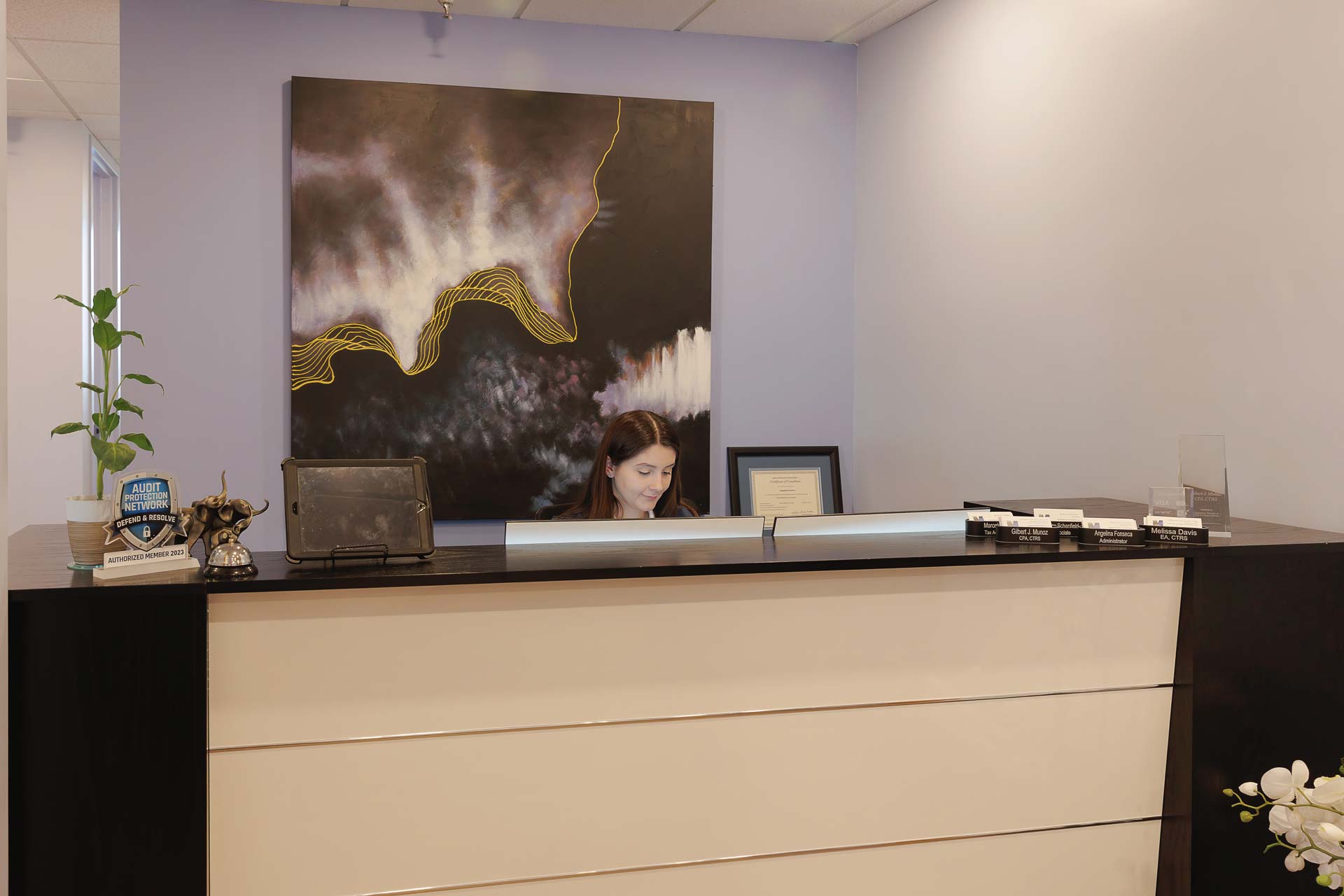 Receptionist at a desk at Munoz & Company, CPA's office